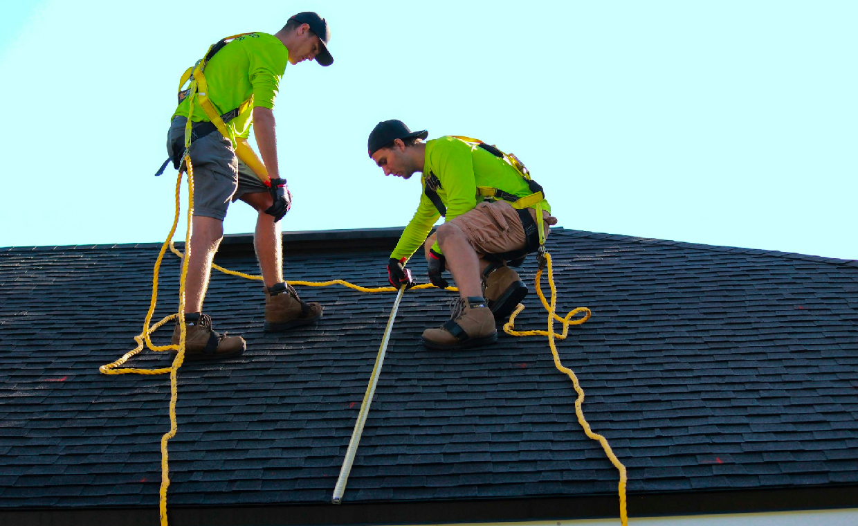 roofing crew wearing fade resistant work shirts